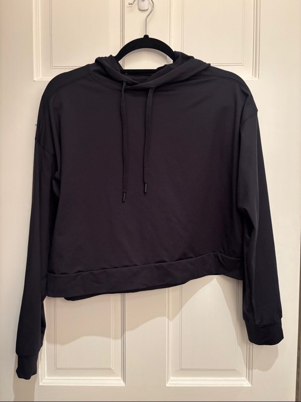 All in Motion - Cropped Black Pullover Hoodie Sweatshirt with Drawstring Hood